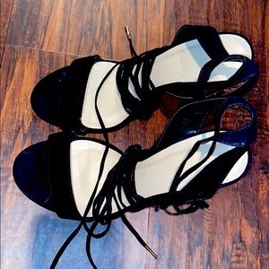 Black strap up heels